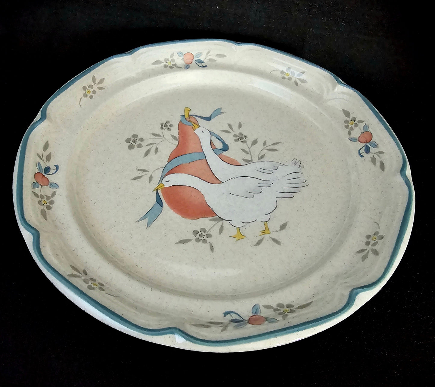 Marmalade Salad Plate, Vintage International Tableworks (1980s). Speckled Cream Stoneware with Geese and Fruits Motif in Red and Blue.