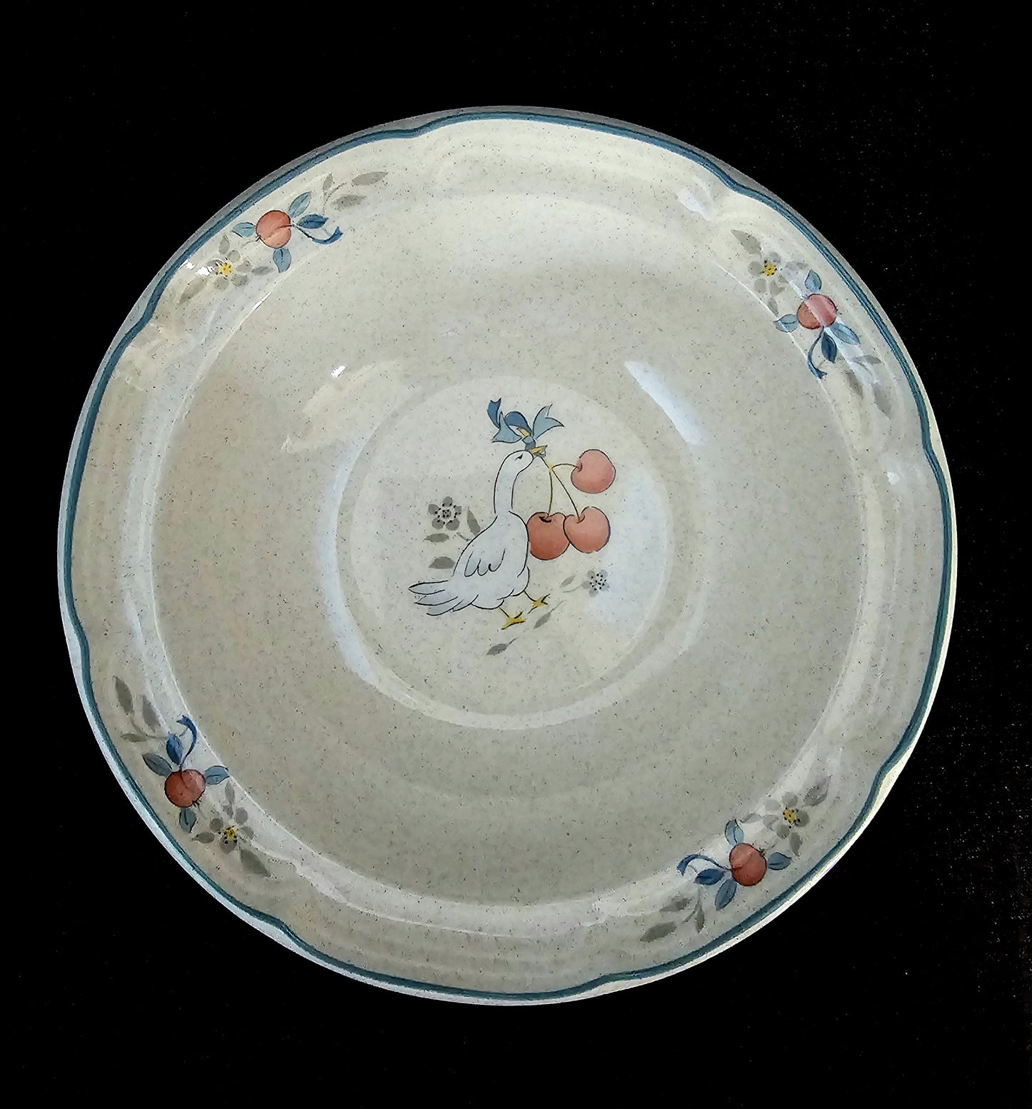 International Tableworks &quot;Marmalade&quot; pattern rimmed cereal bowl. White goose with spray of 3 red cherries tied with a blue ribbon.