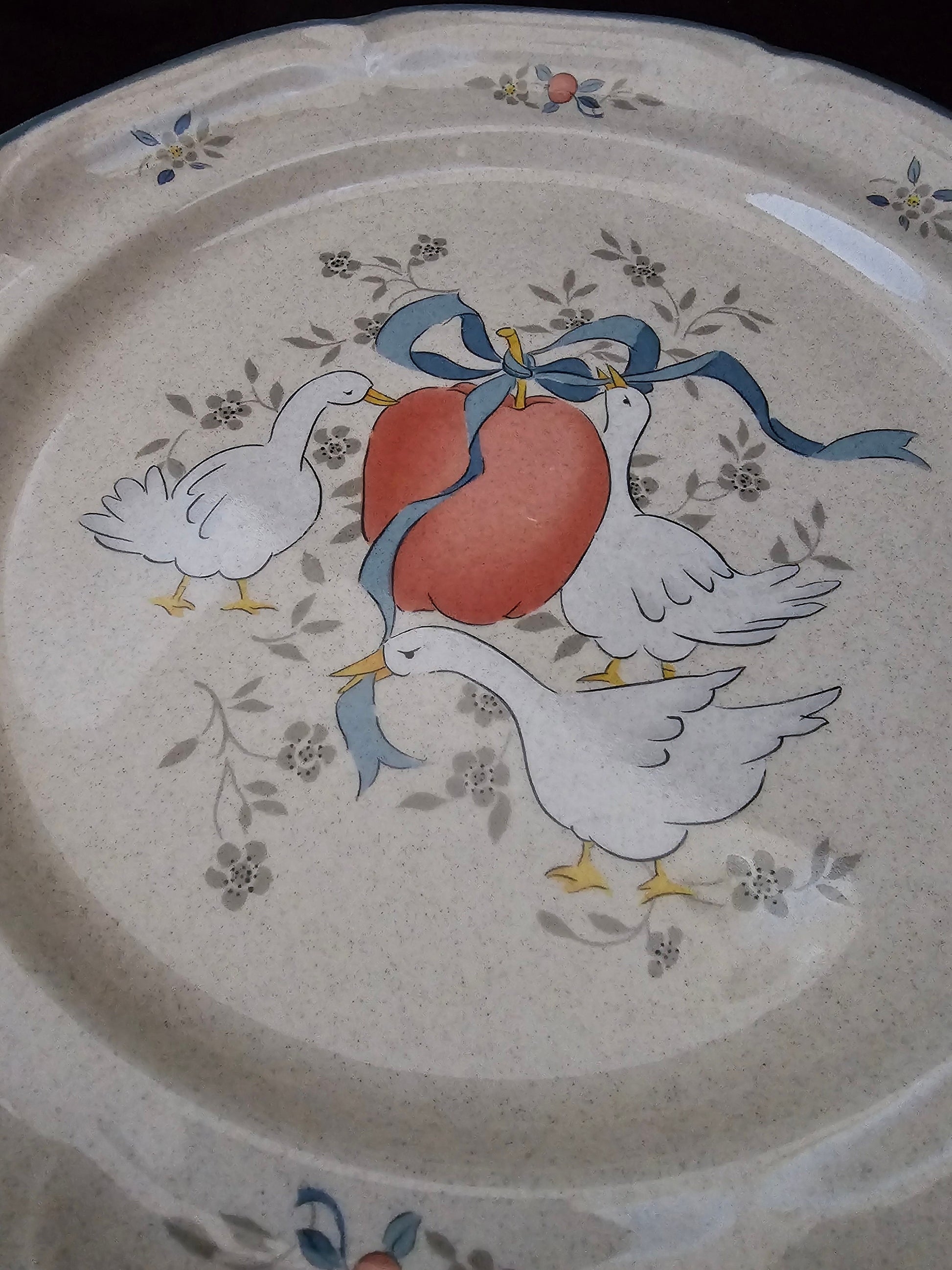 Marmalade Dinner Plate from International Tableworks-Vintage (1980s). Speckled Cream Stoneware with Geese and Fruits Motif in Red and Blue.